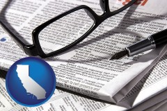 california map icon and a newspaper, with reading glasses and fountain pen