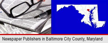 a newspaper, with reading glasses and fountain pen; Baltimore City highlighted in red on a map