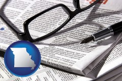 missouri map icon and a newspaper, with reading glasses and fountain pen